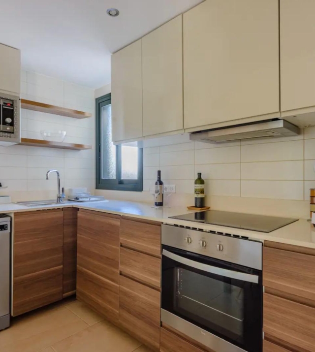 Resa Estates Ibiza te koop for sale townhouse cala tarida kitchen.jpeg